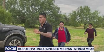 Video shows migrants running past border patrol agents in Texas